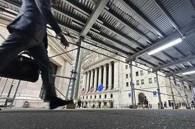 Stock market today: Wall Street edges back from its record highs