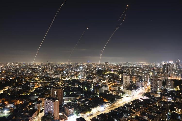 Gaza has lost telecom contact again, while Israel's military announces it has surrounded Gaza City