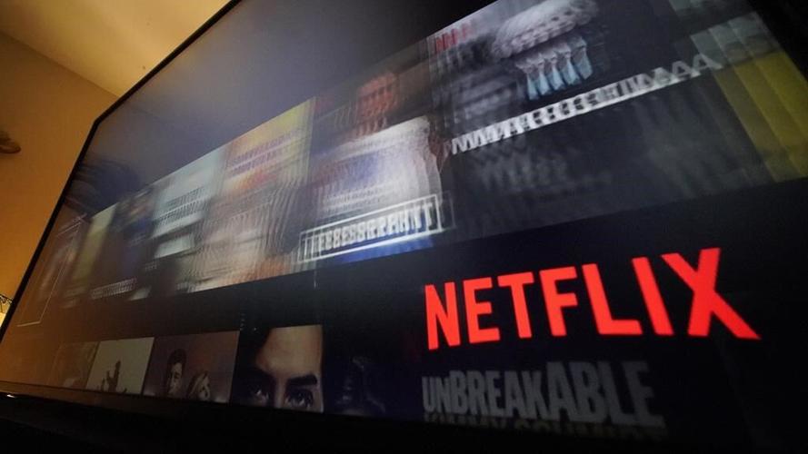 Netflix's 4Q subscribers surge, long-time CEO passes baton
