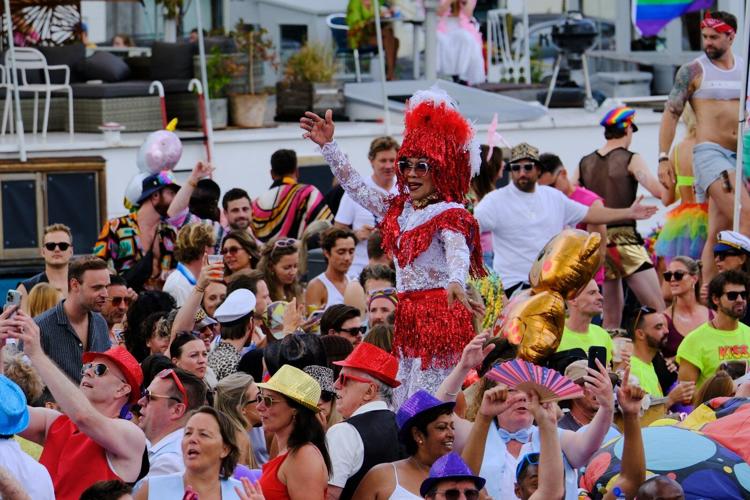 Hundreds of thousands line Amsterdam canals for the annual Pride boat parade