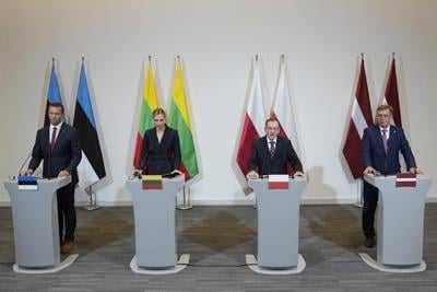 Poland, Baltic states warn they could seal borders with Belarus if military, migrant tensions grow