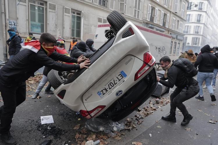Kurds, anti-racism groups gather after deadly Paris shooting