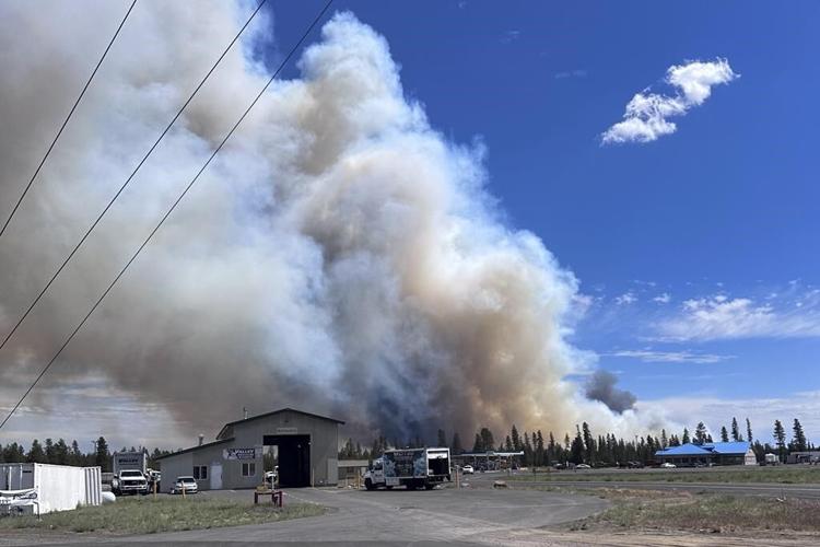 Wind-driven wildfire spreads near popular central Oregon vacation spot and prompts evacuations