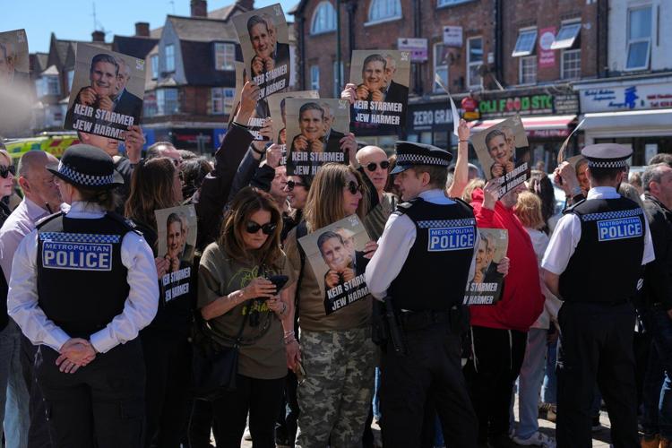UK vows to tackle antisemitism 'emergency' as police probe double stabbing attack