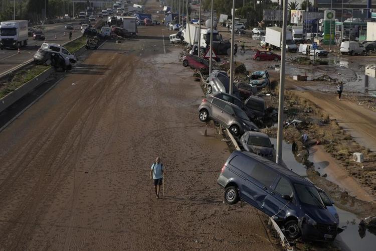 Spain searches for bodies after flood of the century claims at least 95 lives