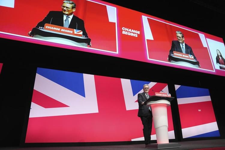 UK leader Starmer aims to shed gloomy image by saying things will get better -- eventually