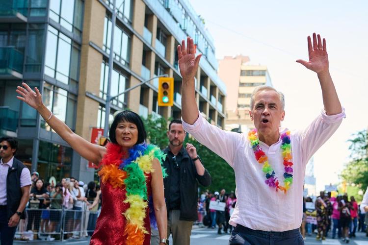 Revellers drench Mark Carney with water as Toronto celebrates Pride Parade