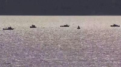 1 person was rescued and a search is underway for 3 others after a boat sinks north of Seattle