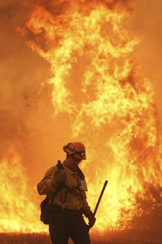 See the world in vertical: Top photos by AP's photojournalists