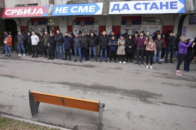Thousands march in Serbia to mark 1 month since a roof collapse killed 15 people