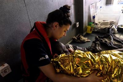 European charity ship rescues 135 migrants but is assigned to distant port in Italy with 359 aboard