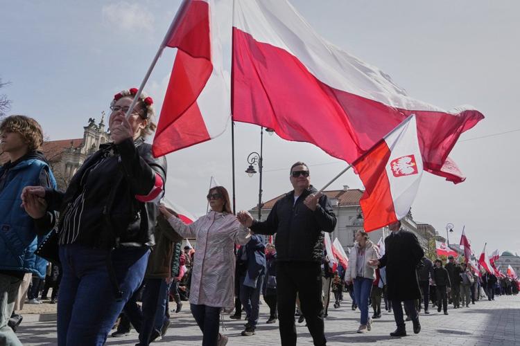 Poles celebrate coronation of 1st king at march supporting conservative presidential candidate