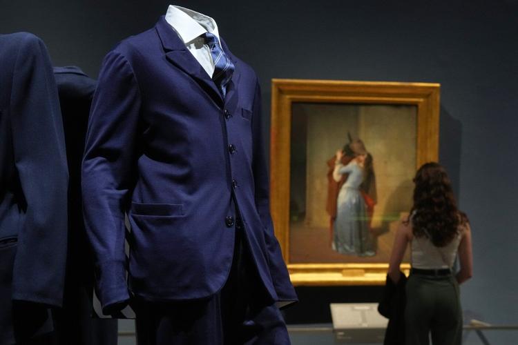 Giorgio Armani's sartorial creations interplay with Italian masterpieces at Milan museum exhibition