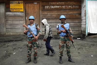 Rebels in Congo take key outpost in the east as peacekeepers withdraw and fighting intensifies