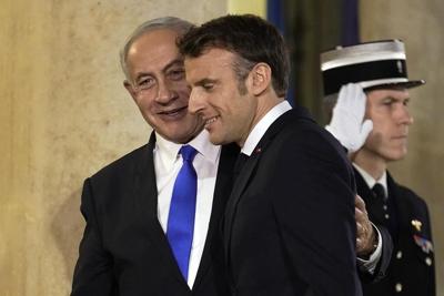 Netanyahu visits France amid spike in Mideast tensions