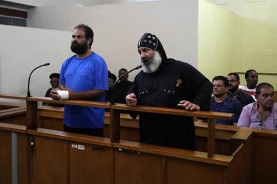 2 men accused of murdering 3 Egyptian Coptic monks appear in a South African court