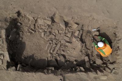 Archeologists find mummy surrounded by coca leaves on hilltop in Peru's capital