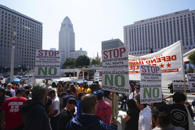 Immigration authorities carry out enforcement activity across Los Angeles amid crowds of protesters