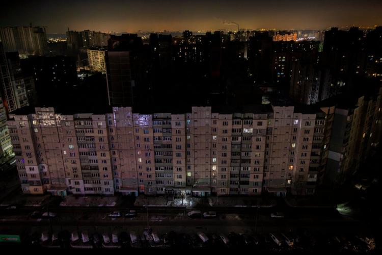 Freezing and in the dark, Kyiv residents are stranded in tower blocks as Russia targets power system