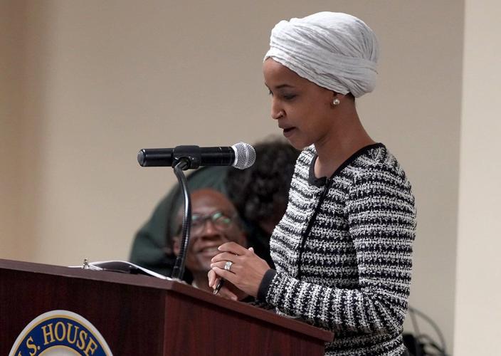 Man who squirted apple cider vinegar on Omar is charged with assaulting and intimidating her