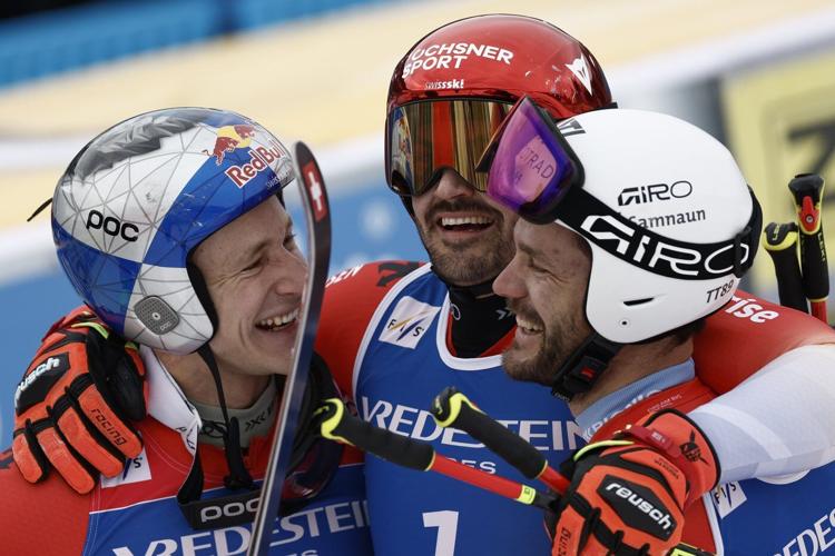 Swiss ski star Odermatt secures overall and GS World Cup titles in race won by teammate Meillard