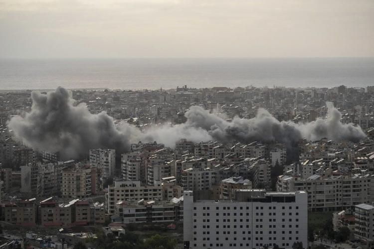 Hezbollah fires more than 180 rockets and other projectiles into Israel, wounding at least 7