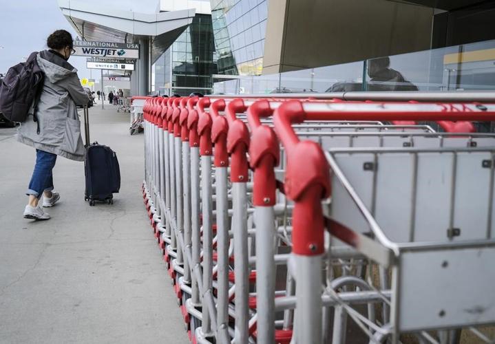 Traveller describes pouring water, falling ceiling tile at storm-hit Calgary airport