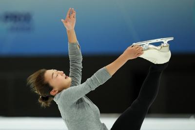 Kaori Sakamoto dazzles in Grand Prix Final to take lead into women's free skate in Beijing