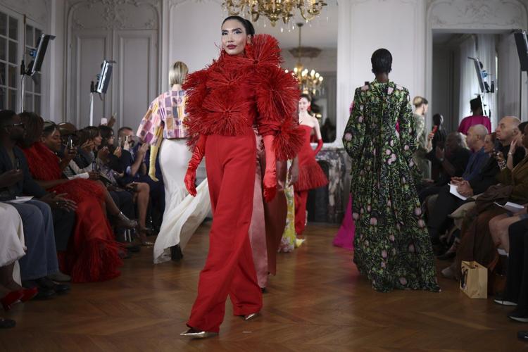 Ayissi fuses African tradition and Parisian craft with bold flower forms at fall couture show