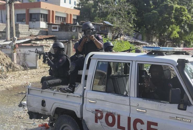 Haiti's main airport and capital frozen after a day of violence