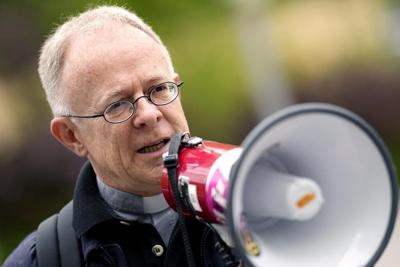 Priest, scientist on trial in Germany over climate protest