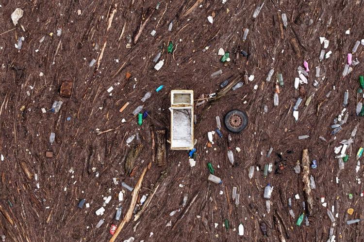 As winter comes, so does garbage. A river in Bosnia chokes in tons of waste year after year