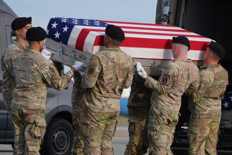 Trump pays respects to 2 Iowa ��ɫtv Guardsmen and interpreter killed in Syria as they return home