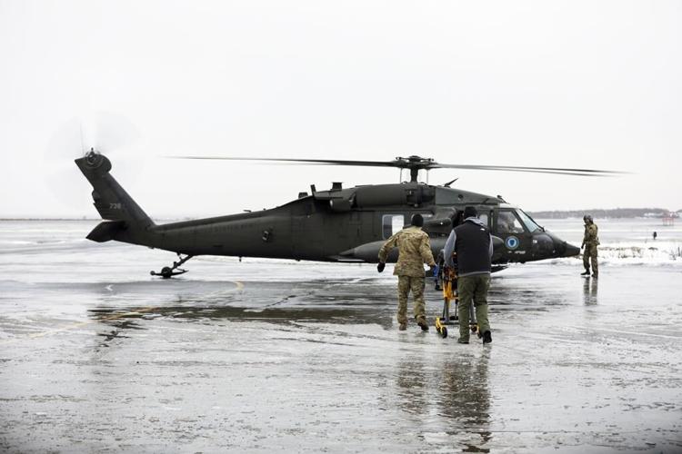 Alaska ɫֱ Guard performs medical mission while shuttling Santa to give gifts to rural village