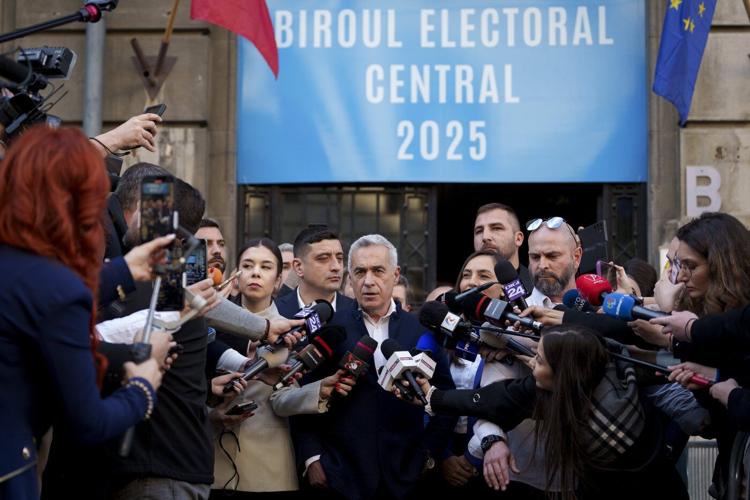 Far-right front-runner in Romania’s annulled presidential race files his candidacy in the rerun