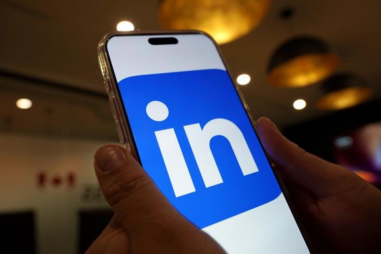 LinkedIn is rife with AI but career coaches say it's still useful for job hunters