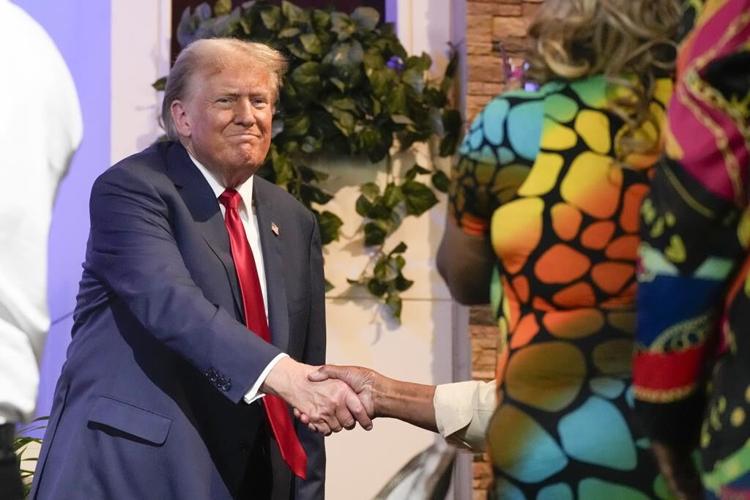 Trump visits a Black church, addresses a MAGA activist gathering amid swing through pivotal Michigan