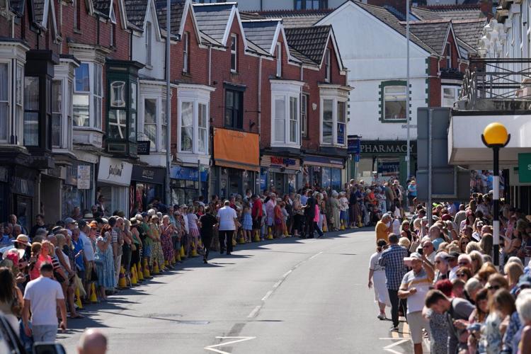 Bonnie Tyler fans line the streets of a Welsh village as her coffin is brought home