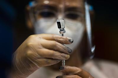Puerto Rico is entangled in a heated public health debate over vaccines and masks
