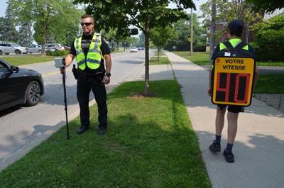 Montreal-area police equip schoolchildren with backpacks that display speed cameras