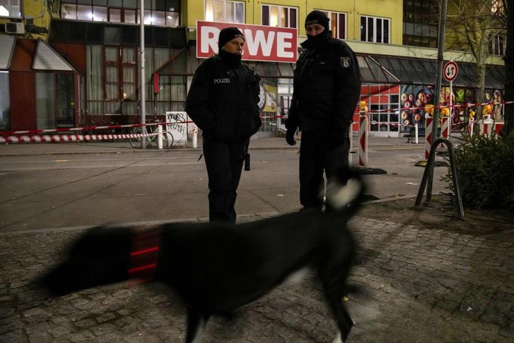 Berlin police say they have detained a man who attacked 2 people with a knife