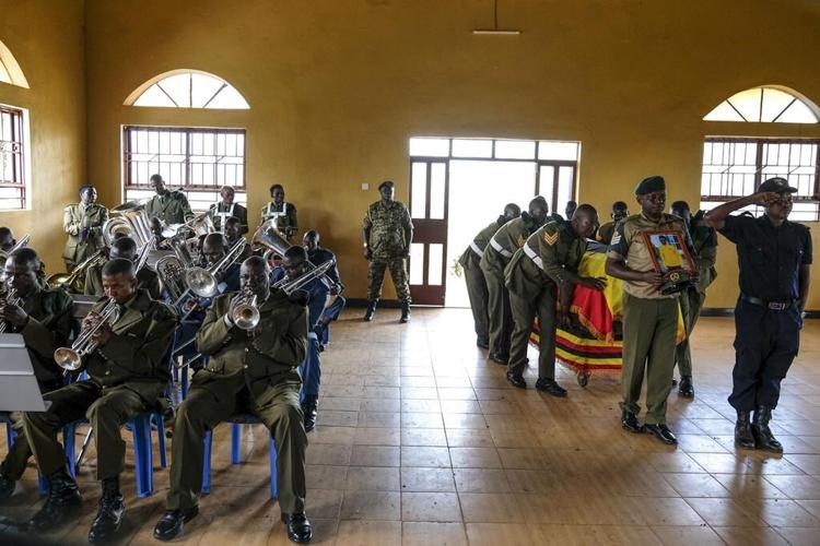Mourners pay respects to Ugandan athlete who died after her partner set her on fire