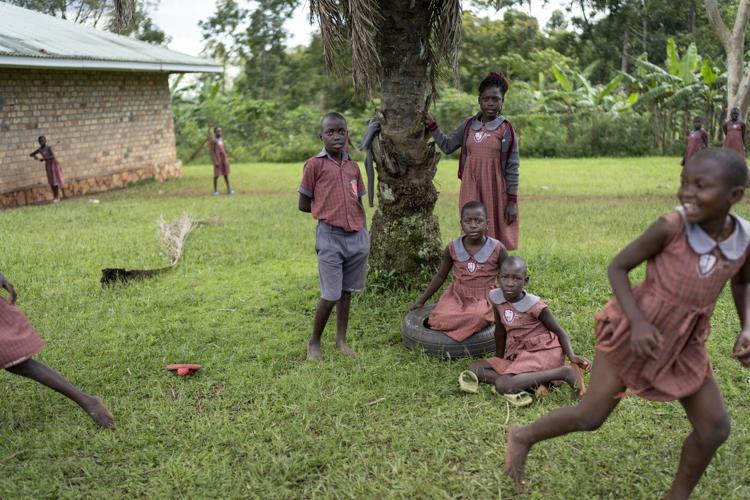 PHOTO ESSAY: In Uganda, a sprawling generation of children finds its fate entwined with elders