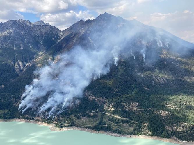Adams Lake wildfire flares as wind, harsh terrain challenge B.C. on multiple fronts