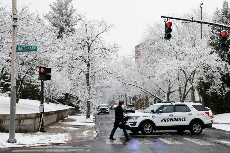 Person of interest detained in Brown University shooting that killed 2 and wounded 9