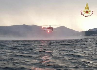 2 Italian agents, 1 ex-Israeli agent among 4 dead in boat that capsized in storm on Italian lake