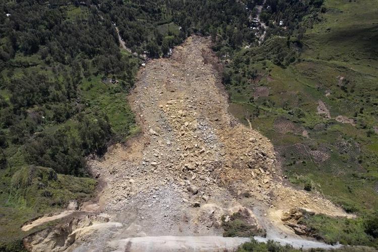 Papua New Guinea landslide survivors slow to move to safer ground after hundreds buried
