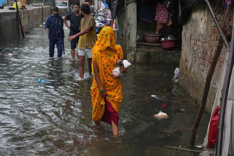 Delayed rains bring water shortages to cities and uncertainty to farms across India