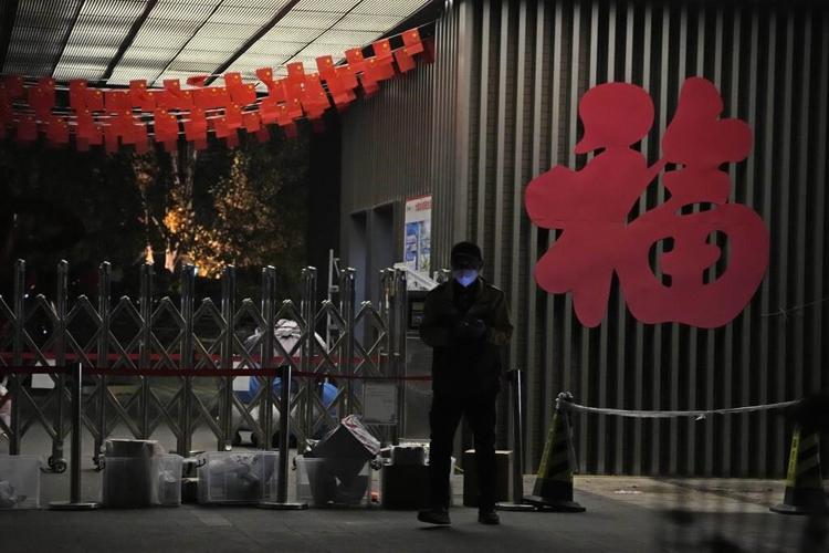 China expands lockdowns as COVID-19 cases hit daily record