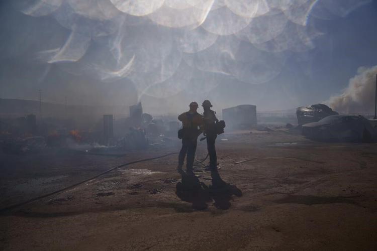 California firefighters gain ground against big wildfires after hot, windy weekend